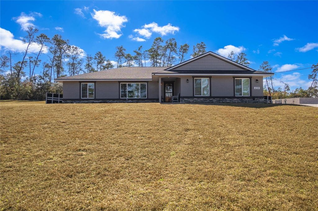 Photo of 4330 W Drake Lane, Dunnellon, FL 34433 (MLS # OM718992)