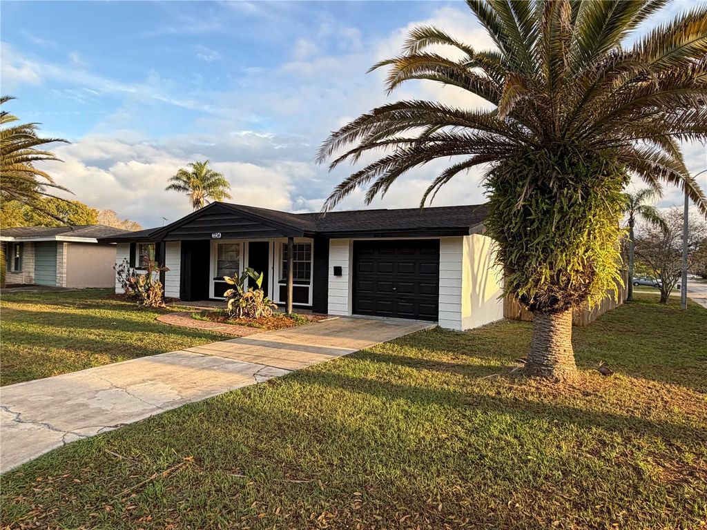 Photo of 7234 Magnolia Valley Drive, New Port Richey, FL 34653 (MLS # TB8483383)