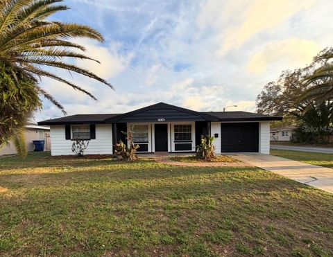Photo of 7234 Magnolia Valley Drive, New Port Richey, FL 34653 (MLS # TB8483383)