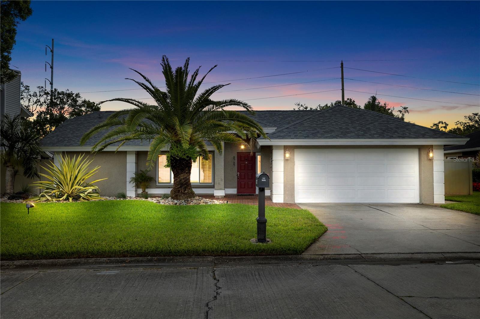 Welcome to this beautifully updated mid-century modern gem in the sought-after Glen Lakes community—an intimate enclave of just 83 homes, tucked behind a serene, oak-lined entrance. Located just minutes from the Gulf beaches, downtown St. Pete, and Tyrone Square, this single-story residence offers both style and convenience. Inside, you'll find a fully remodeled kitchen, updated bathrooms, and a 2025 roof and A/C system for true peace of mind. The open layout features a cozy gas fireplace and flows seamlessly to a screened-in pool—perfect for year-round Florida living. Additional upgrades include a tankless water heater, remodeled laundry room, and spacious living areas ideal for both relaxing and entertaining.