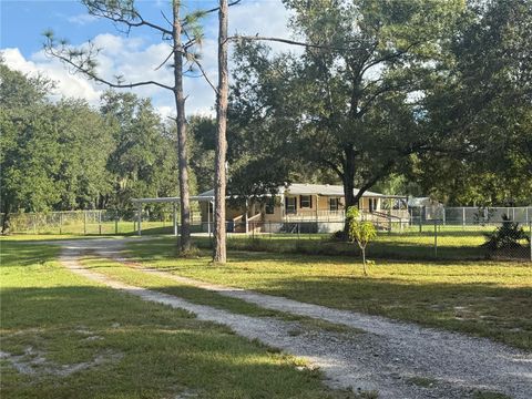 Photo of 5510 Gator Country Dr, Plant City, FL 33565 (MLS # TB8416261)