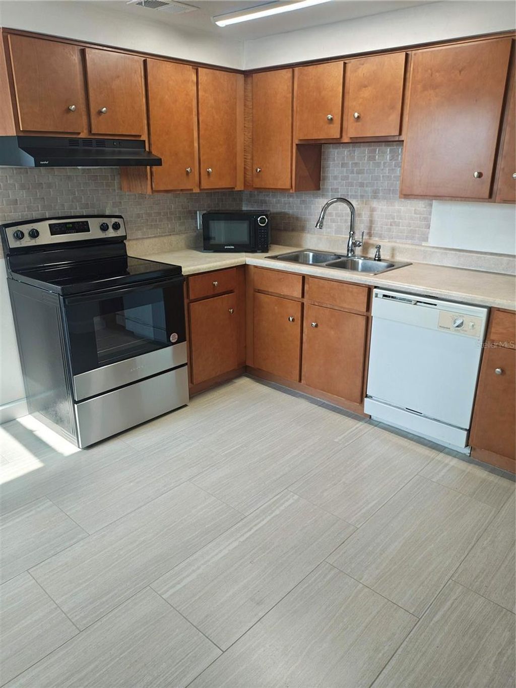 Photo of 11301 110th Terrace, Largo, FL 33778 (MLS # TB8440554)