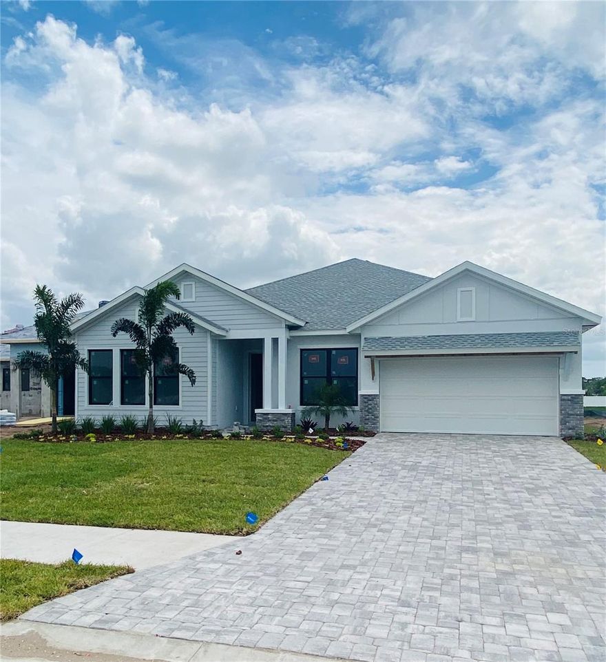 Under Construction. Live in luxury with The Colston floor plan, by David Weekley homes, located in the brand-new, suburban lifestyle, gated community of Lakeview Crossing in Sarasota. This single-story home gives you over 3,000 sq ft of comfort, sitting peacefully on a pond, where you can imagine coming home to serene views with sightlines of the pond from the moment you walk in the front door. Once inside, you’ll love the thoughtfully designed open concept with vaulted ceilings in the main living areas, flooded with natural light and a designer kitchen perfect for celebrating all of life’s milestones.  The French County interior design selections give this home a warm and comforting feel you won’t want to leave. The owner’s retreat is split from the guest bedrooms, so you will have your own private oasis to wind down and feel royal in. In addition to the 4 bedrooms, there is a dedicated den with French doors where you can work in peace as well as a TV/bonus room the family can sneak away in. The 4-car tandem garage gives you plenty of storage and space to park all your vehicles, and the extra spacious indoor utility room will make you want to do your laundry more.  Enjoy your morning coffee or evening glass of wine out back on your extended lanai or even on the spacious front porch where you can watch the kids play. Sitting on an oversized lot, you have plenty of room to add a pool and create the backyard oasis of your dreams. Also, you are conveniently located close to downtown Sarasota (10 miles), UTC shopping center (9.4 miles), Siesta Key Beach (12 miles) & SQR airport (15 miles). Experience the Best in Design, Choice and Service with this new David Weekley home in Sarasota, FL.