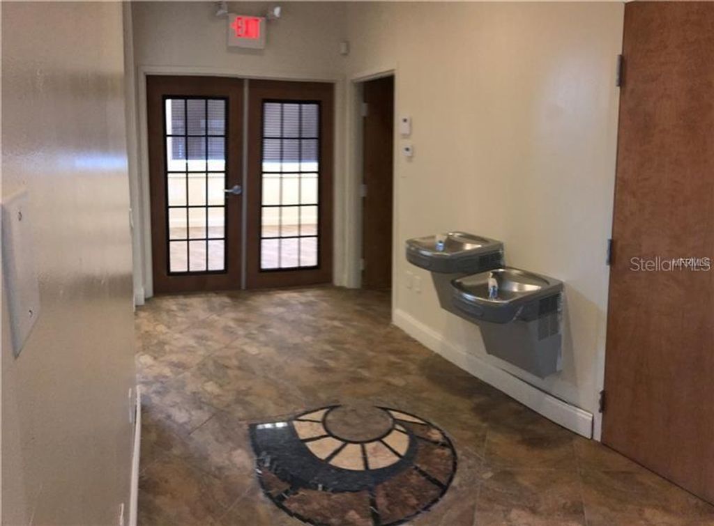 Photo of 6236 Kingspointe Parkway #7, Orlando, FL 32819 (MLS # O6404993)
