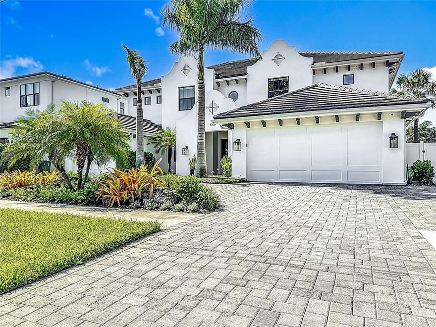 Motivated Seller!! This is an amazing home in the heart of South Tampa. 6 bedrooms, 4.5 baths. Exquisitely designed layout; parlor w/wet bar, Playroom/Study off of Great Room doubles as another bedroom, Downstairs Guest Suite with its own personal exit to the pool.
You will love the formal dining, butlers pantry, breakfast nook, an oversized mudroom w/bench & cubbies that you can charge those electronics in, as well as a washer/dryer hook up (for ease w/pool towels or messy uniforms!). Oversized two car garage w/room for workshop on one side of the home and another 1.5 car garage on the other side.  The covered rear lanai with outdoor kitchen looks over the beautiful pool saltwater modern designed pool w/sun shelf and glass mosaic spa.  Can I say whole house generator, even though it did not flood during hurricanes, so you have the piece of mind during storm season that your will have power. Features; Gray Stained Cyprus Tongue Groove Exterior Ceilings, 6.5" wire brushed wood floors throughout, a Sub Zero Appliance Package, high-end Custom Cabinetry w/stacked glass uppers w/X design at uppers, designer tiles and marble bathrooms, Quartz counter tops to emulate Marble, 8' solid doors, 7" crown, Boxed Beam Great Room Ceiling, Cased Windows, Custom Master BR Closet Built-ins, Smooth Drywall, Recessed electrical outlets in base boards, Icynene Spray Foam Insulation, All Block Construction, Hurricane Impact Rated Windows, 2 Gas Tankless Water Heaters, Water Softner Loop & Tile Roof. Outdoor living leaves nothing to be desired! , Travertine Deck and Outdoor Kitchen. If you decide you need an elevator, the shaft is already there. This one checks all the boxes. Just a short walk to Coleman Middle school.