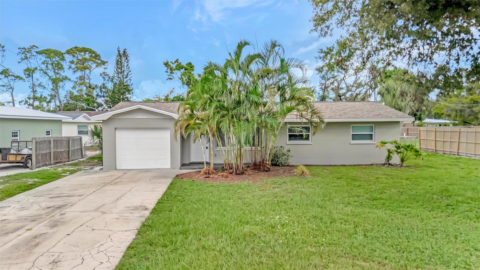 Welcome to 3816 1st Ave W, Bradenton Florida, a beautifully updated 3-bedroom, 2-bath bungalow nestled on a generous 0.30-acre lot in desirable West Bradenton. Step inside to discover stylish LVP flooring, a completely renovated kitchen with shaker cabinetry, stainless appliances, granite counters, and a chic subway tile backsplash. Both bathrooms have been refreshed with modern updates, new light fixtures and blinds throughout enhance the coastal charm, and a screened lanai invites leisurely relaxation. The expansive, partially fenced backyard and convenient one-car garage complete the picture of comfortable Florida living. Just minutes from beaches, schools, dining, and shopping, this turnkey home combines modern finishes with an unbeatable location and can be an ideal opportunity for owner-occupants or savvy investors.