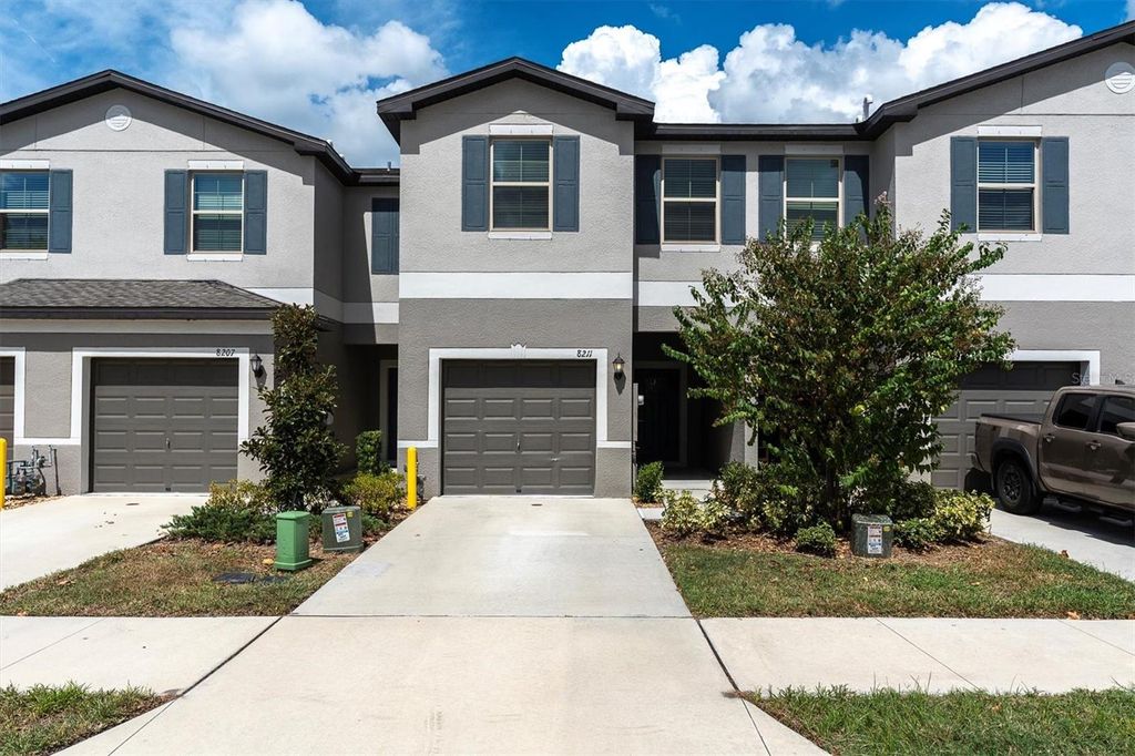 Photo of 8211 Crescent Oaks Drive, New Port Richey, FL 34655 (MLS # W7879174)