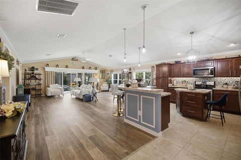 Tiny photo for 16897 SE 74th Soulliere Avenue, The Villages, FL 32162 (MLS # OM731158)