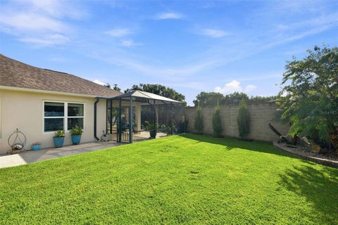 Tiny photo for 16897 SE 74th Soulliere Avenue, The Villages, FL 32162 (MLS # OM731158)