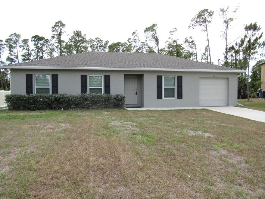 Situated on an oversized, quiet cul-de-sac, this 2024 Holiday Builder home is ready for you to move right in!  The open floor plan feels much larger that the square footage shows.  The kitchen features wood cabinetry, stainless appliances, a large breakfast bar, kitchen RO system and a pantry.  There are sliders from the dining area affording you the view of the private backyard.  Beyond the foliage is a freshwater canal.  The ensuite master bedroom features a nice sized bath with a walk-in shower. NO HOA fees!  This home is in a great location with easy access to I-75 and just minutes to shopping, restaurants, golf, fishing, Historic Downtown Punta Gorda and Fisherman's Village.  North Port is one of Florida's fastest growing cities offering the perfect combination of affordability, convenience and quality. You are only a short drive to the Gulf Coast Beaches.  It's a great place to live, work and play.  Call today to schedule a showing for your new home!