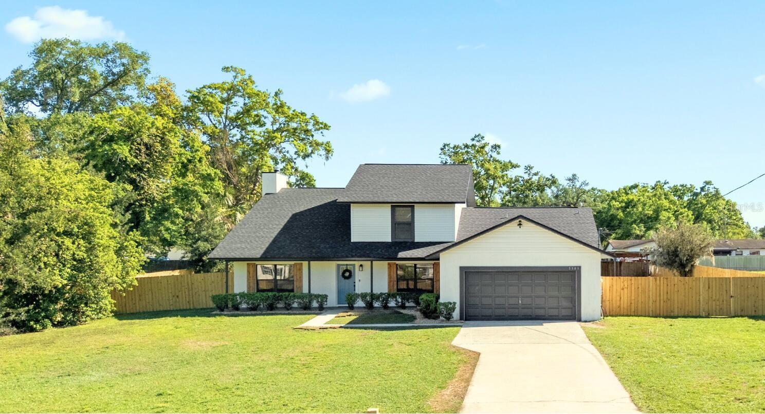 Searching for a home. No problem! See what's inside this move-in ready home with top to bottom finishes. This is an updated modern farmhouse situated between Plant City and Dover in Eastern Hillsborough County. Sitting on a fully fenced half-acre lot with no HOA, means this home offers the ultimate in space, privacy, and lifestyle freedom. With 4 spacious bedrooms all with walk-in closets, plus a large 5th bedroom that can be used as a flex space, home office, or media room. The layout will make this your forever home where you can host the large family gatherings, privacy for work-from-home employees, or multi-generational living. The first-floor master suite creates long-term comfort and privacy. The primary suite features a luxurious wet-room bath with a Jacuzzi tub and designer finishes, double sink vanity and a water closet. Step into the heart of the home: a gourmet kitchen boasting an oversized quartz peninsula, brand-new appliances, custom built-ins, and a sunny breakfast nook. Enjoy everyday comfort with plank ceramic tile throughout the main areas and plush new carpet upstairs. The working fireplace in the living room sets the stage for cozy evenings, while a secret door to a hidden bonus space offers a world of imagination to little ones and adults. This is not just a gorgeous modern farmhouse home, but a home with land and space for chickens. Outside, you’ll find an entertainer’s dream with a built-in outdoor kitchen, plus room to park an RV, boat, or trailer—no restrictions here. The versatile shed, complete with electric and water hookups, is ready to be transformed into your she-shed, man cave, workshop, or in-law apartment. With a new roof, 2020 AC, and well-maintained septic and well system, this home is turnkey and low-maintenance making it a stellar investment and great for buyers looking for an affordable home that will never have surprise community assessments and increased HOA fees, found in cookie-cutter communities. Layout conducive to a Padsplit investor. Located just minutes from I-4, commuting to Tampa, Lakeland, Plant City or Orlando is easy and convenient. If there is one home you must see - this is one of them!