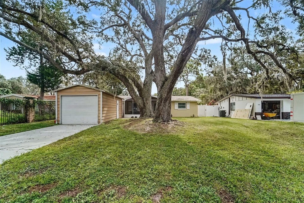 Photo of 5818 Baker Rd, New Port Richey, FL 34653 (MLS # TB8555406)
