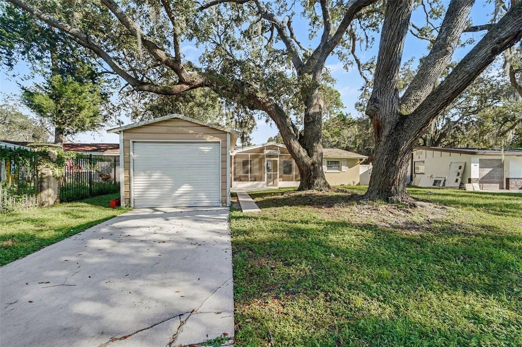 Photo of 5818 Baker Rd, New Port Richey, FL 34653 (MLS # TB8555406)