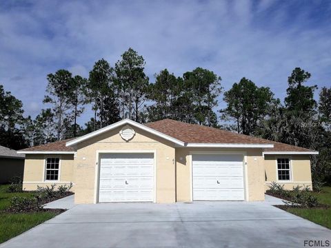 Photo of 61 Pine Haven Drive, Palm Coast, FL 32164 (MLS # FC314360)