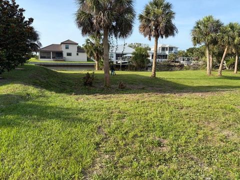 Photo of 128 Seaside Point, Flagler Beach, FL 32136 (MLS # O6412017)