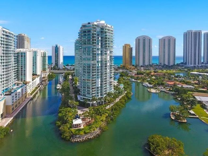 Exquisite 3-Story Townhome on Oceania Island – 3,206 sq. ft. | Fully Furnished. CALL OWNER DIRECT 

One-of-a-kind residence that combines the privacy of a home with the amenities of a five-star resort.  Located within a guard-gated community featuring 24-hour concierge, valet service, and a doorman, every detail is designed for comfort and peace of mind.  This rare townhome offers three direct entryways for ultimate convenience: arrive through an elevator from the main lobby, your own two-car garage entrance, or a ground-level walkway with direct walk-out access.

Inside, soaring 10’ ceilings and an expansive open floor plan create a light-filled, inviting atmosphere. The chef’s Italian Scavolini kitchen boasts marble countertops and premium finishes. With three ensuite bedrooms plus a versatile bonus room, this home provides both elegance and functionality. The spa-inspired master bath features dual vanities, a soaking tub, and a custom his-and-hers LED-lit walk-in closet.

Luxury upgrades abound: custom built-in closets, Somfy motorized window treatments, KEF speakers with Sonos sound system, Tom Dixon designer lighting, Legrand switches, linear air vents, and striking 36x72 porcelain tiles. A dramatic illuminated staircase enhances the home’s modern aesthetic.

Relax and unwind on your private no-car promenade level, where mornings are greeted with birdsong and sweeping views. More than just a residence, this townhome is a luxurious island retreat—offering the perfect balance of sophistication, privacy, and resort-style living.

As part of the Oceania Club community, you’ll also enjoy access to a full-service private beach resort directly across the street, featuring valet parking, a world-class spa, state-of-the-art gym and fitness classes, squash and racquetball courts, island tennis courts, a restaurant, and a private beach club complete with beach chairs, umbrellas, towels, and more.
HOA: Collected monthly $2,376.63
Beach Club Dues: $994.40, collected quarterly
Yearly mandatory club annual spend $1000 includes: restaurant, and salon/spa (massage, nails, hair, facials).