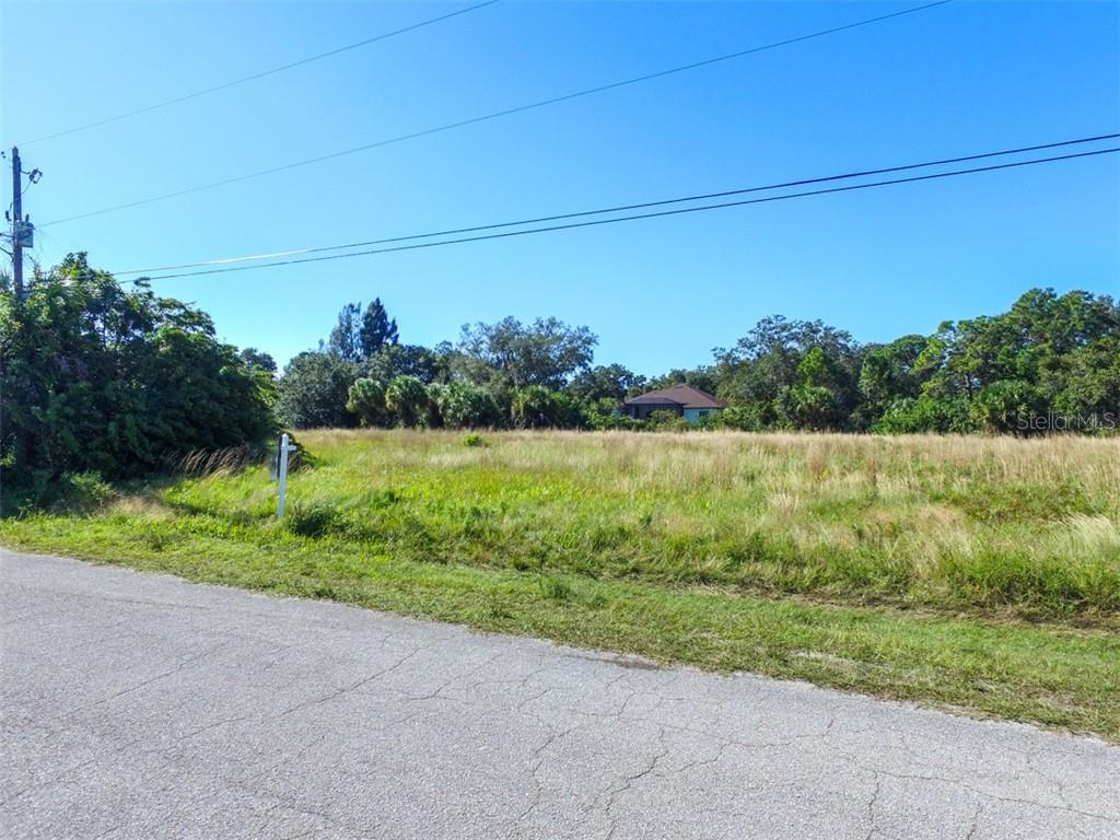 NOT FLOOD ZONE! ADDITIONAL LOT FOR SALE NEXT: LOT 7 N6140022 (for additional cost ask listing agent).
Investors Special! Oversized residential lot (RSF-3: Residential Single Family 3) in the Warm Mineral Springs neighborhood of North Port. This lot is within a short walking distance of the world-renowned Warm Mineral Springs, known world-wide for its healing waters!This Residential Lot sits in a quiet neighborhood minutes away from Warm Mineral Springs NOT IN A FLOOD ZONE or HOA or CDD. Excellent location, peaceful neighborhood, minutes from I-75 & Tamiami Trail! Convenient to Florida’s best beaches, golfing, public boat ramps, marinas, shopping, physicians, water park, Atlanta Braves Practice Stadium, Tampa Bay Rays Practice Stadium, Historic Riverfront Downtown Punta Gorda & Fishermen’s Village, and a short drive to Venice, Sarasota and Boca Grande, etc. All information deemed reliable, but not guaranteed; buyer to confirm all.