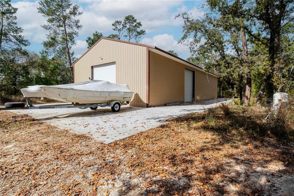 Photo of 12301 Denton Avenue, Hudson, FL 34667 (MLS # TB8449229)