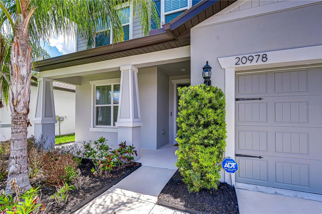 Photo of 20978 Monza Loop, Land O Lakes, FL 34638 (MLS # TB8500994)