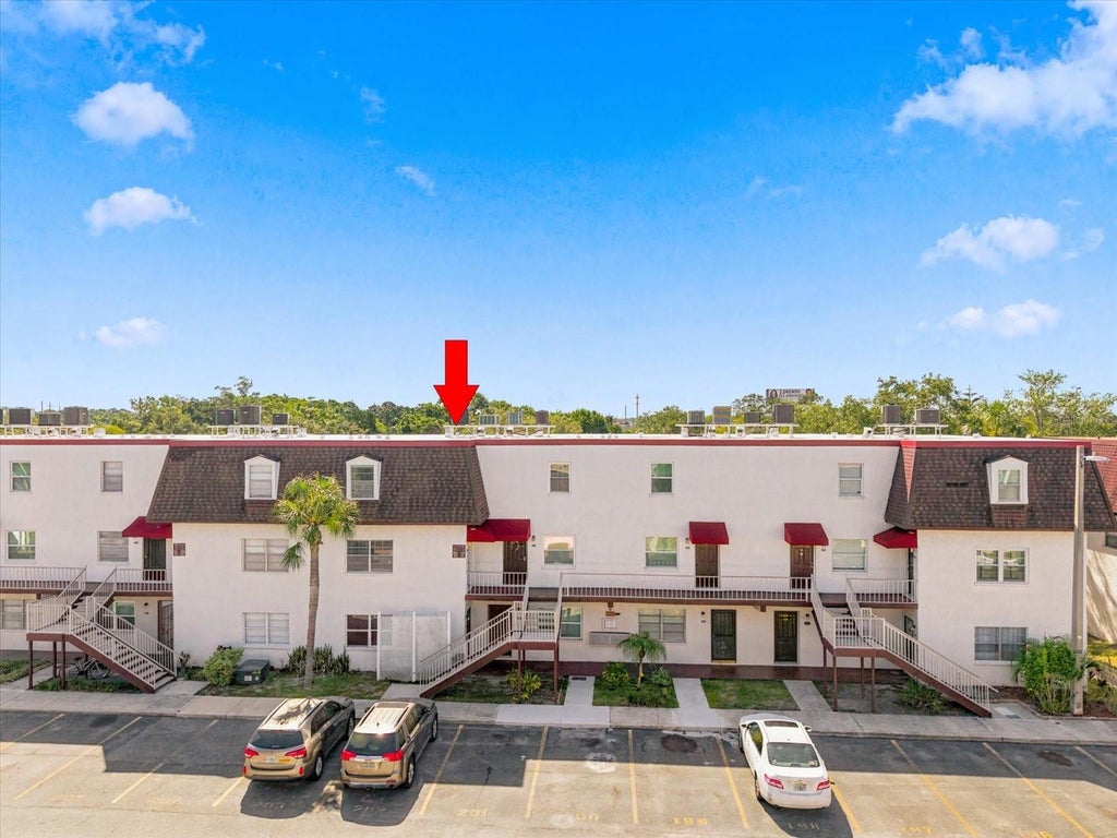 Photo of 9009 Tudor Drive #G206, Tampa, FL 33615 (MLS # TB8523557)