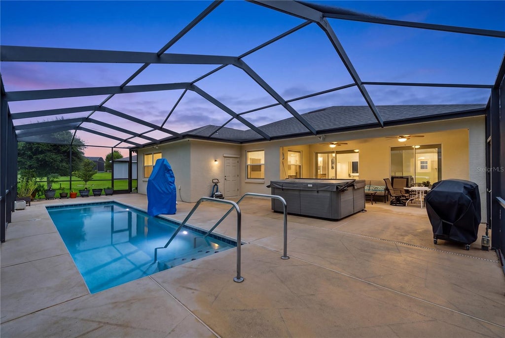Photo of 4419 Bent Creek Lane, Leesburg, FL 34748 (MLS # O6432325)