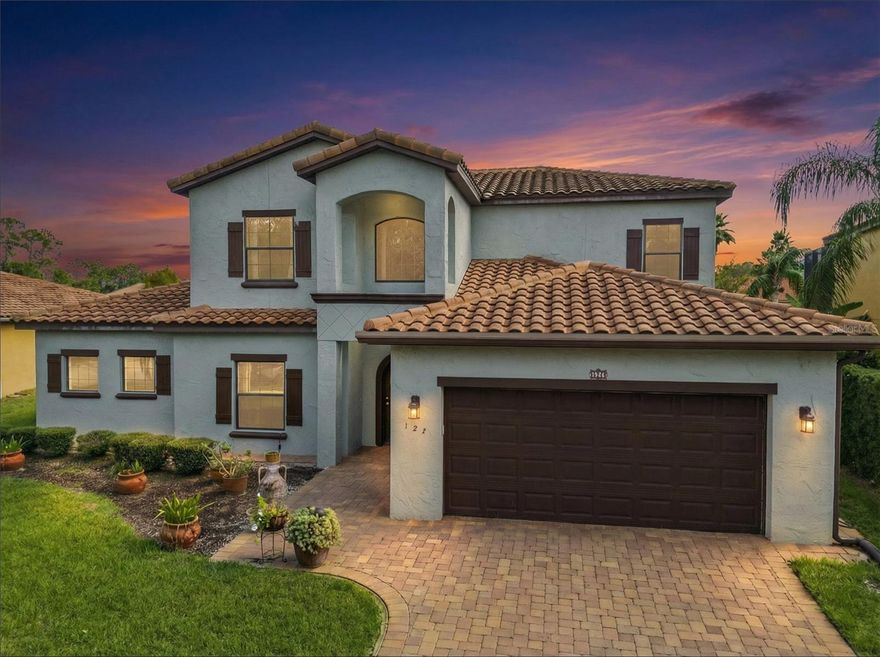 Rare Dual-Suite Home with Serene Pond Views in Gated Riviera Bella
This lovely 4-bedroom, 3.5-bathroom home presents a rare opportunity for multi-generational families or those who love to host in style, featuring two complete and private primary suites—one on each floor.  Nestled in the peaceful gated community of Riviera Bella with resort amenities.  From the moment you arrive, the home’s pristine condition is undeniable, highlighted by a freshly cleaned and restored tile roof that shines like new. Step inside to a breathtaking cathedral foyer that sets a tone of grandeur, leading into a seamless, open-concept living space. Beautiful wood-grain tile floors flow throughout the great room, kitchen, and dining area, creating a stylish and carpet-free environment that is both elegant and easy to maintain. The heart of the home is the inviting great room, which flows effortlessly to the outdoor lanai. Here, you can begin and end your day with tranquil views of a picturesque pond, with the soothing sights and sounds of a charming fountain as your daily backdrop. The generous kitchen is a chef’s dream, boasting oversized 42” dark cabinets, sleek stainless steel appliances, a closet pantry, and a breakfast bar perfect for casual meals. The first-floor primary suite is a peaceful retreat complete with dual closets and a spa-like ensuite bathroom featuring dual sinks, a luxurious garden tub, and a walk-in shower with waterfall, handheld, and contemporary nozzles. A spacious dedicated office off the main entry provides a quiet space for productivity. Ascend to the second floor to find a versatile loft area, perfect for a media room or play space. Two large bedrooms share a well-appointed bathroom with dual sinks, while the second-floor primary suite offers a private haven for family or guests. Nearly as spacious as the first, it includes its own ensuite with dual sinks, an oversized shower, a large walk-in closet, and its own picturesque views of the fountain and pond below.  Residents of Riviera Bella enjoy exclusive access to resort-style amenities, including a clubhouse and a sparkling community pool just a short walk away. This exceptional property is more than a home; it’s a lifestyle of comfort, security, and luxury. Don’t miss your chance to own this rare dual-suite gem. Schedule your private tour today and prepare to fall in love.