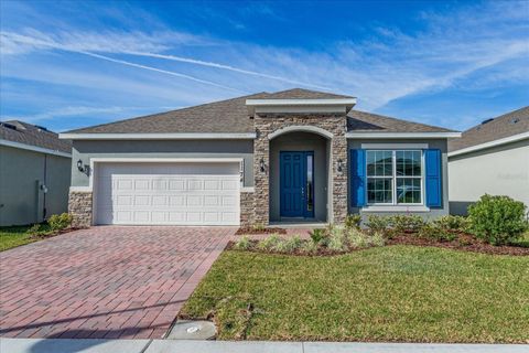 Photo of 2031 Firethorn Loop, Haines City, FL 33844 (MLS # G5104153)