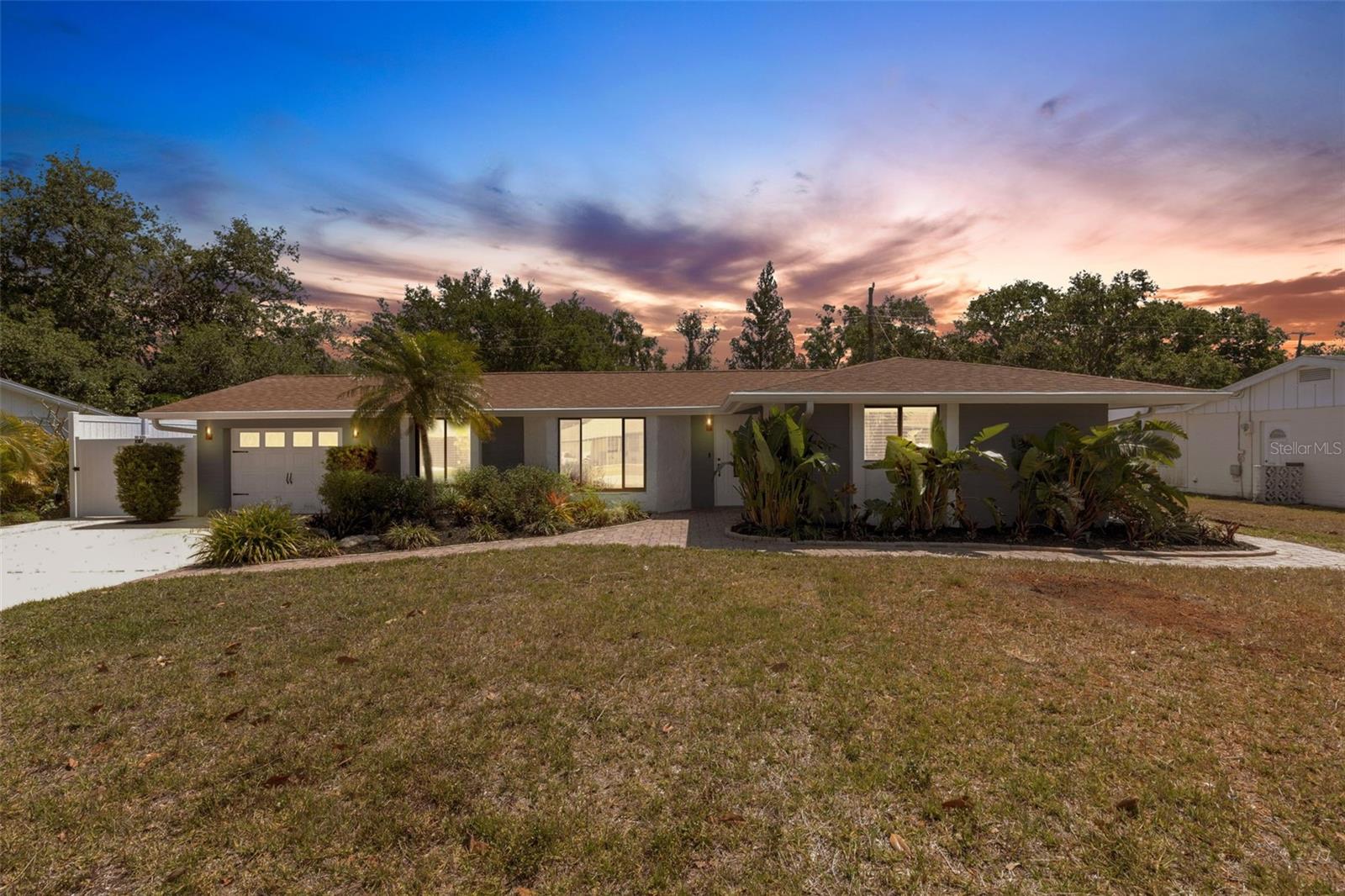 One or more photo(s) has been virtually staged. Come see this gorgeous 3 bedroom, 2 bath home just minutes to the best Sarasota has to offer. Recently renovated, most everything on the interior is new with fresh paint, new vinyl flooring throughout, new closet organizers in all walk-in closets, new door and cabinet hardware throughout, all LED recessed lighting with wi-fi enabled dimmers. Brand new vinyl privacy fence, fully encloses the backyard pool area to give total peace and privacy. New white limestone rock installed in backyard reducing maintenance and water usage. All pavers washed, sanded and sealed with "wet look" sealant, pool light and outdoor lighting replaced with LEDs and exterior freshly painted with a new tankless water heater and power panel. Centrally located, just minutes to Siesta Key, Downtown, St Armand's and Lido and all the great amenities Sarasota has to offer. Come see this home today!