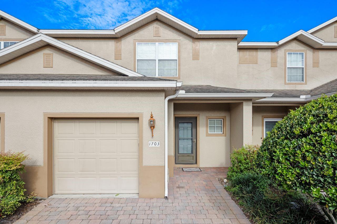 Welcome to easy living in the beautiful gated pool community of The Parke at Hanover! This move-in-ready, 2-story townhome combines style, comfort, and convenience in one impressive space. From the moment you arrive, the charming brick-paver front porch and driveway set the tone for a warm, inviting home. Step inside to an open-plan layout that’s perfect for both relaxing and entertaining. The spacious living area flows seamlessly into the dining space, creating a bright and welcoming atmosphere for everyday life. The kitchen shines with elegant 42-inch cabinets, modern finishes, and plenty of counter space for cooking, snacking, and gathering. And with the washer and dryer already included, you can settle in with ease. Upstairs, your private retreat awaits. The large primary suite features a huge walk-in closet and a true ensuite bathroom with dual vanities—giving you space and comfort every day. The additional bedrooms are filled with natural light and provide plenty of room to spread out and unwind. Step outside your front door and enjoy all the benefits of this beautifully maintained community. Take a dip in the sparkling swimming pool, relax under the cabana, or take a walk through the well-kept common areas. With no rear neighbors, you’ll love the added peace and privacy. This home is perfectly located just minutes from shopping, dining, and recreation. Zoned for top-rated Seminole County schools and close to major roads, your daily commute and errands are a breeze. Plus, the low HOA fee makes this community even more appealing. Schedule your private showing today and discover why The Parke at Hanover is the perfect place to call home! Also ask about 5% down payment assistance for FHA loans through our preferred lender.