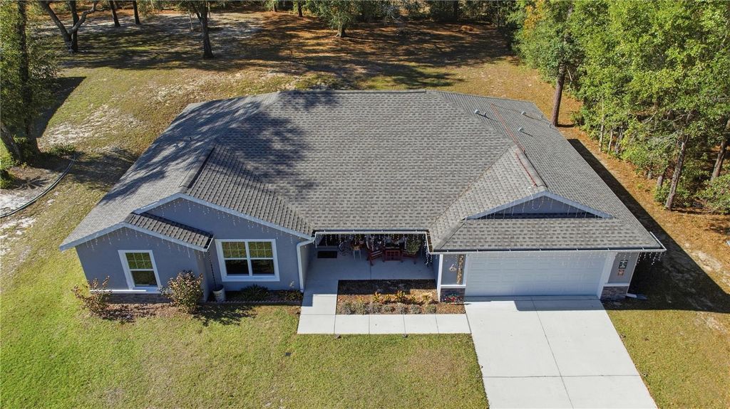 Photo of 9239 SW 197th Circle, Dunnellon, FL 34432 (MLS # OM715152)
