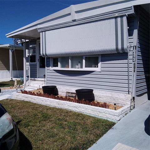 Photo of 10473 Holiday Shores Drive #303, Largo, FL 33773 (MLS # TB8356198)