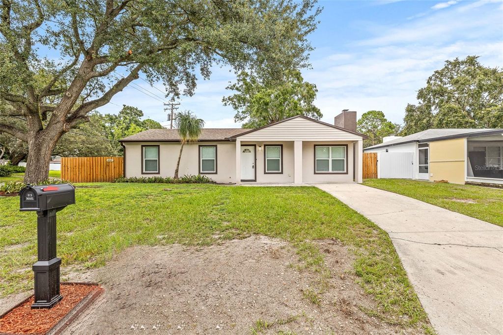 Photo of 10517 N Hamner Avenue, Tampa, FL 33612 (MLS # TB8425462)