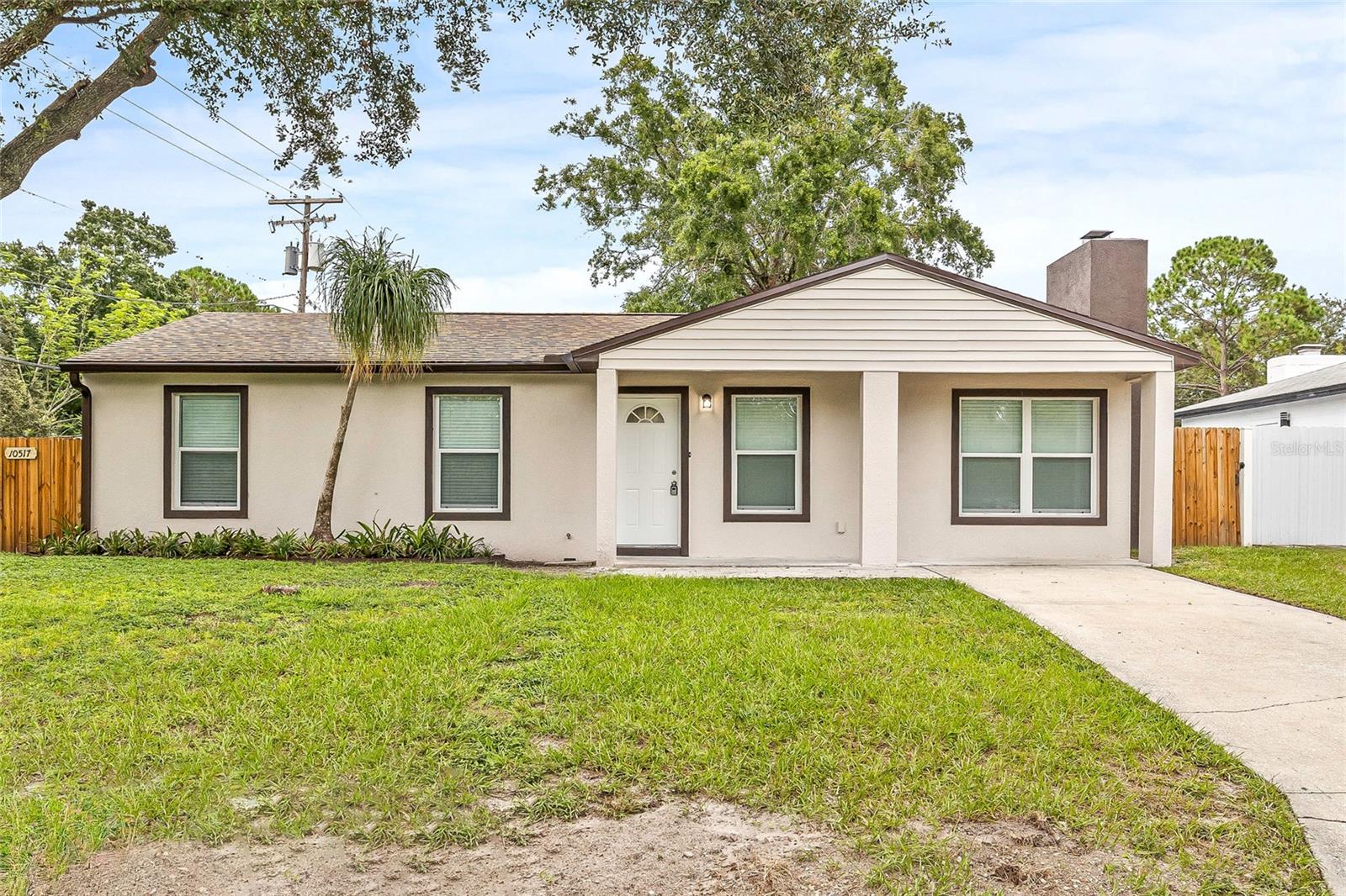? Completely Remodeled in Forest Hills! ? Welcome to this stunning 3-bedroom, 2-bathroom home situated on a spacious corner lot in the heart of Tampa’s sought-after Forest Hills neighborhood. Every detail of this remodel was thoughtfully completed with permits, giving you peace of mind for years to come. Step inside and fall in love with the open-concept layout, featuring a gorgeous kitchen with a large island, perfect for entertaining. The cozy fireplace adds warmth and charm to the living space, while the updated finishes throughout create a modern yet inviting feel. The home also offers flexible living space with potential for an in-law suite, ideal for multi-generational living or guests. Enjoy the convenience of a central location, close to schools, parks, shopping, dining, and major highways—making it easy to get anywhere in Tampa Bay.