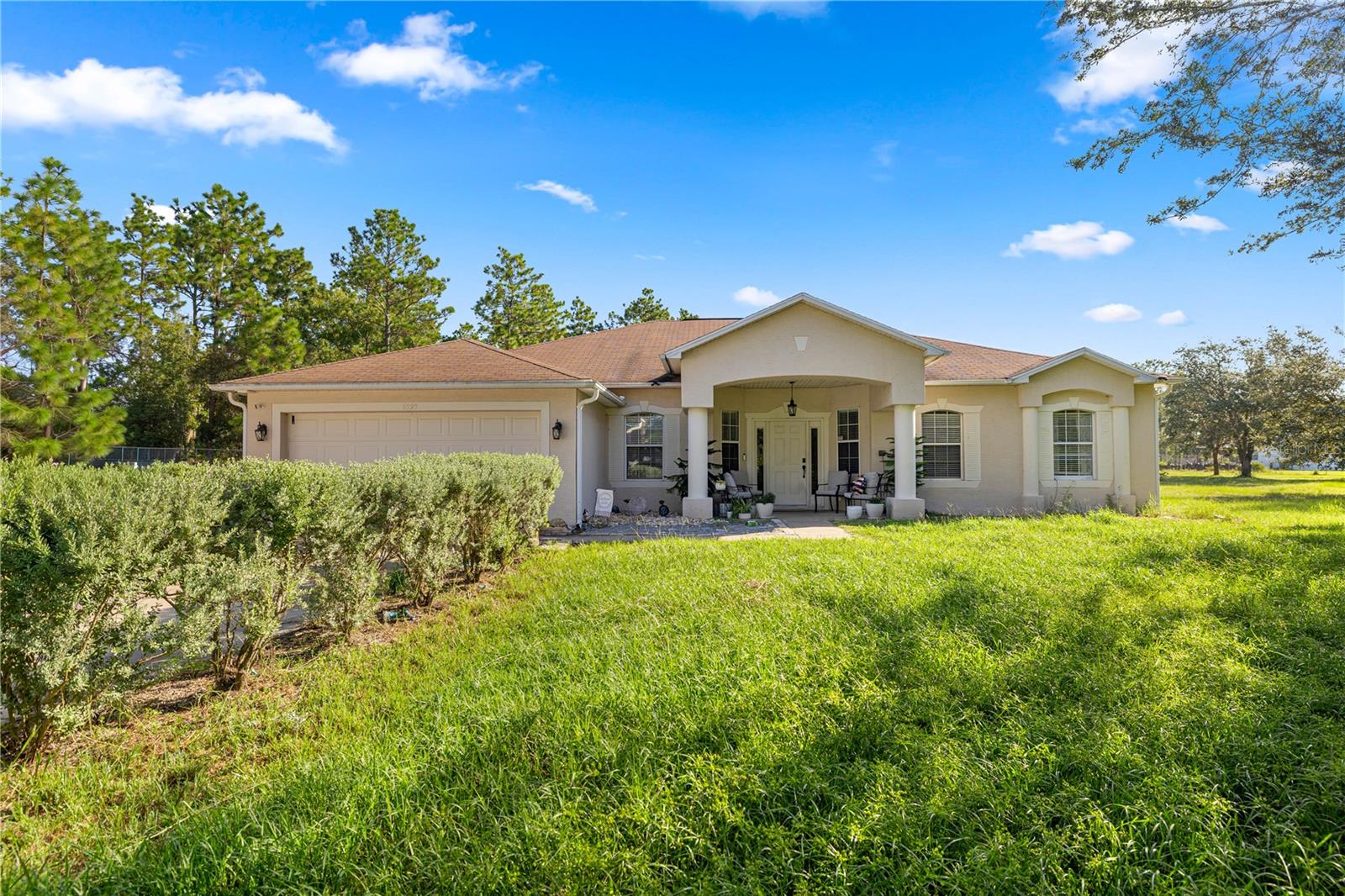 Spacious 4-Bedroom Home on 1.33 Acres – No HOA! Welcome to this beautifully maintained 4-bedroom, 2-bath home, ideally situated on a fully fenced 1.33-acre corner lot in a peaceful, no-HOA community. Built in 2003, this home offers an open-concept layout perfect for modern living and entertaining. The primary suite features a walk-in shower and dual sinks, providing comfort and convenience. Enjoy added flexibility with a climate-controlled enclosed bonus room—ideal for extra storage, gym or pet playroom. Additional bonus room upon entry - as a home office, gym, or playroom. Additional highlights include a brand-new HVAC system installed in 2024, spacious bedrooms, and plenty of outdoor space to create your own private retreat. Whether you're looking for room to roam, space for your toys, or the freedom of country living with city convenience, this property truly has it all.