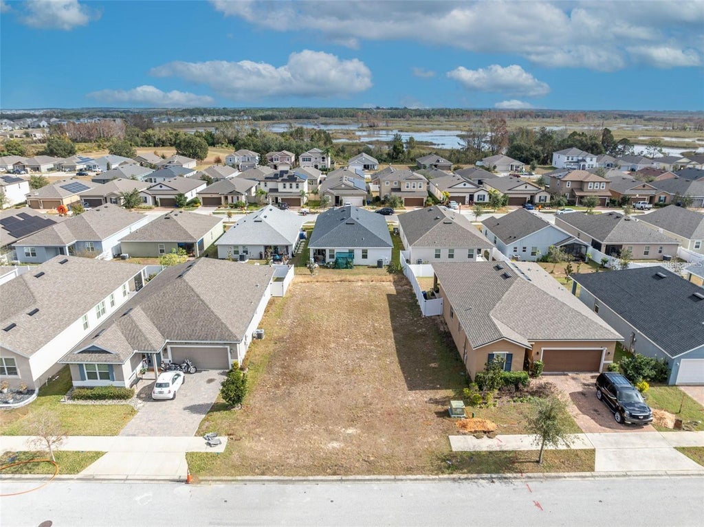 Photo of 1190 Stratton Avenue, Groveland, FL 34736 (MLS # O6419484)