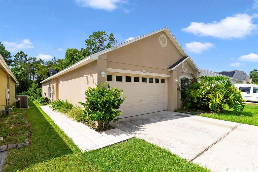 Photo of 13142 Odyssey Lake Way, Orlando, FL 32826 (MLS # O6436361)