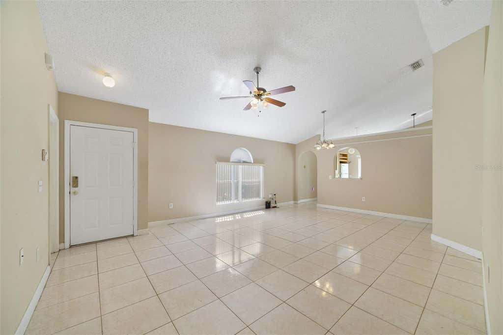 Photo of 13142 Odyssey Lake Way, Orlando, FL 32826 (MLS # O6436361)