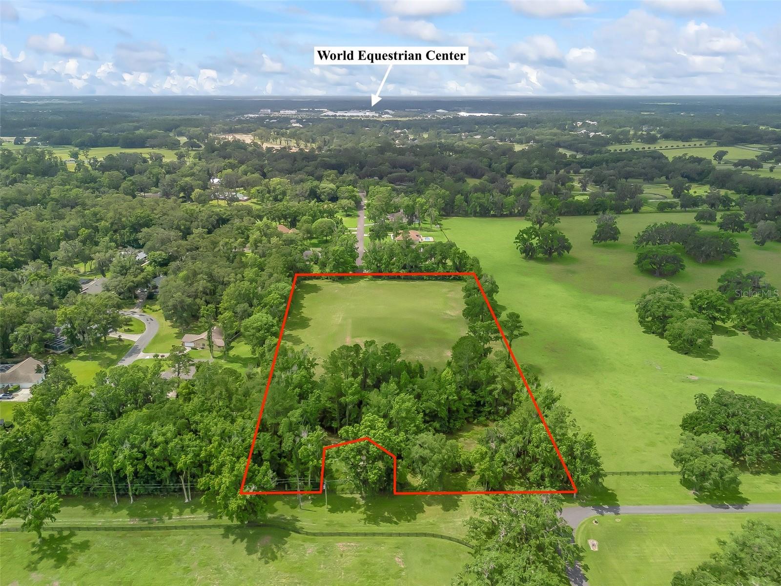 Seize the rare chance to own almost 6 acres- parcel in the heart of Ocala’s renowned Horse Country, just 3 minutes from the World Equestrian Center (WEC). This prime location offers unparalleled access to world-class equestrian facilities and a thriving equestrian community.
Property Highlights:
Zoning & Land Use: The property is zoned R-1
Development Potential: With its expansive acreage, the land offers ample space for building a custom estate house
Investment Opportunity: Ocala's land values have experienced significant growth, with property prices increasing over years in some areas since the opening of WEC. This trend underscores the area's rising demand and potential for future appreciation.
Nearby Amenities:
World Equestrian Center (WEC): Located just 3 minutes away, WEC is a premier equestrian venue offering top-tier facilities and events.
Shopping & Dining: The upcoming Shoppes Off 80th, an 80,000-square-foot outdoor shopping venue, is set to enhance the area's luxury retail offerings.
Recreational Facilities: The Florida Horse Park and the Marjorie Harris Cross Florida Greenway’s extensive trail system are nearby, providing ample opportunities for outdoor activities.
Why Ocala?
Ocala is celebrated as the "Horse Capital of the World," home to over 400 thoroughbred farms and training centers. The region's limestone-rich soil and mild winters create an optimal environment for equestrian training and breeding.
Whether you're looking to build your dream home, establish an equestrian facility, or invest in a growing market, this property offers limitless potential. Don't miss out on this exceptional opportunity to be part of Ocala's vibrant equestrian community.