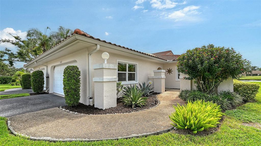 Photo of 7340 Golf Pointe Circle, Sarasota, FL 34243 (MLS # A4664716)