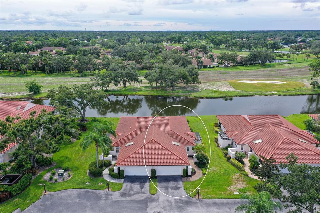 Photo of 7340 Golf Pointe Circle, Sarasota, FL 34243 (MLS # A4664716)