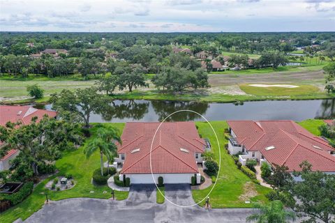 Photo of 7340 Golf Pointe Circle, Sarasota, FL 34243 (MLS # A4664716)