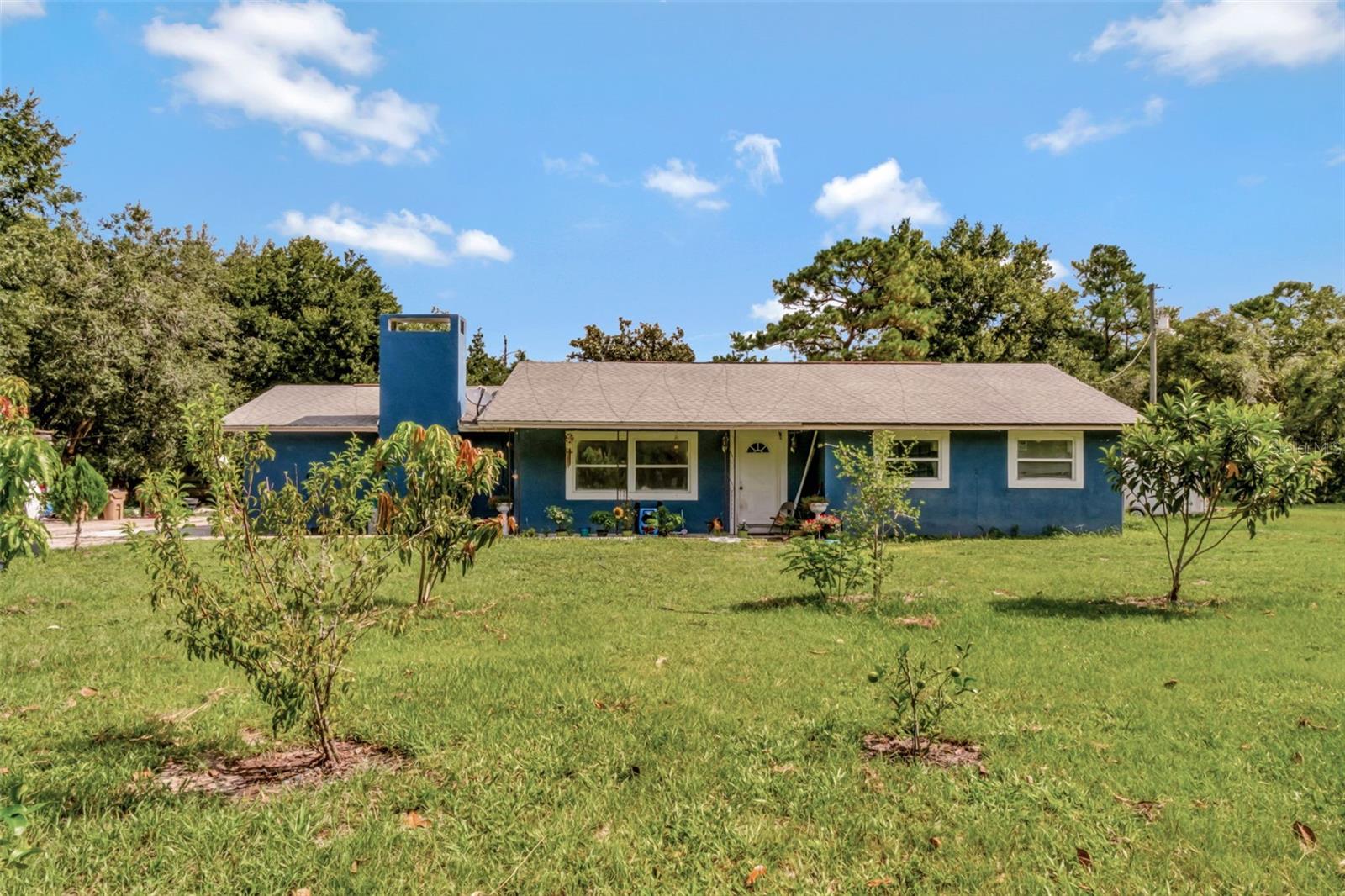 Seller is willing to negotiate price. Price is not set in stone. Bring your best! Nestled on 4.7 sprawling acres, this idyllic single-story home of 2,506 sq ft offers the perfect blend of rustic charm and Florida serenity in sought-after Sorrento. Built in 1970, the property features four spacious bedrooms and two full baths, ideal for families seeking peaceful country living in a serene, pastoral setting.
As you wind down the private lane and approach the property, you're greeted by sweeping greenery and ample room to roam. Inside, the generous layout provides comfort and flexibility—perfect for cozy evenings or expanding into stylish, open spaces. The home’s generous footprint invites you to reimagine modernized living areas, a polished country kitchen, or even a dreamy outdoor entertaining terrace.
Beyond the home, your personal slice of Florida awaits: endless possibilities for gardens, equestrian pursuits, or simply basking in the open air. This parcel combines generous acreage with promising potential—whether you're cultivating a homestead, creating a nature retreat, or designing a custom renovation, the stretch of land invites creativity and expansion.