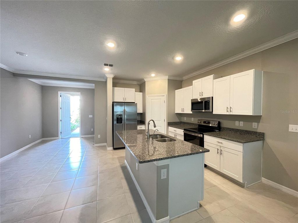 Photo of 31653 Blue Passing Loop, Wesley Chapel, FL 33545 (MLS # TB8421729)