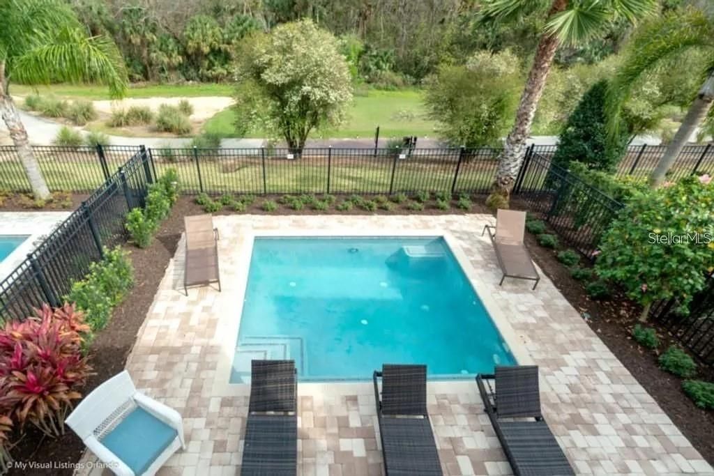 Photo of 1041 Castle Pines Court, Reunion, FL 34747 (MLS # O6377118)