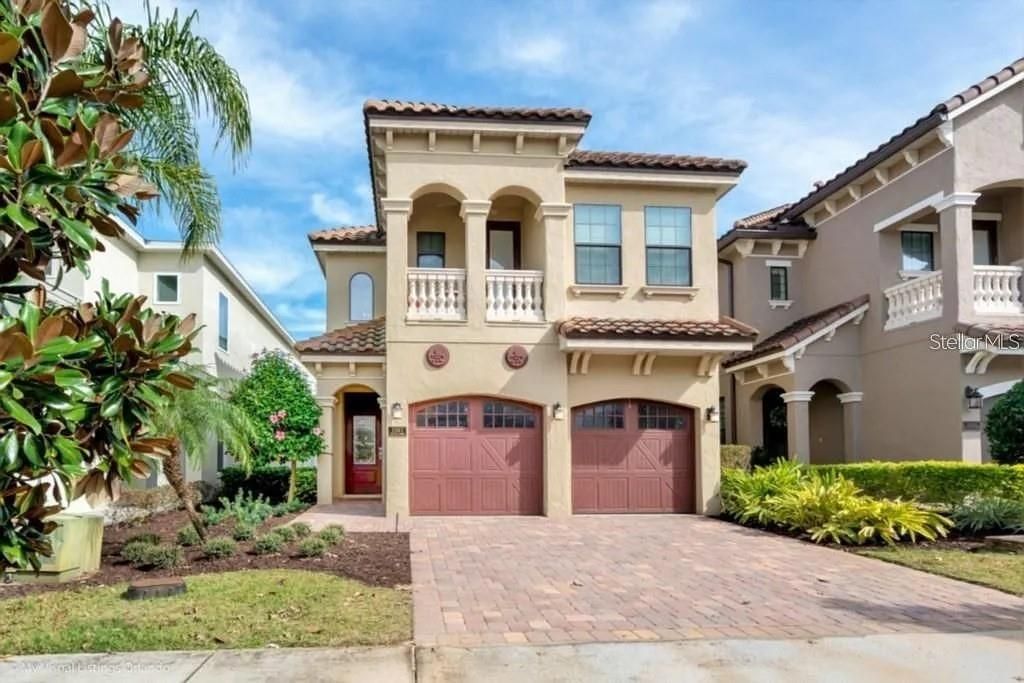Photo of 1041 Castle Pines Court, Reunion, FL 34747 (MLS # O6377118)