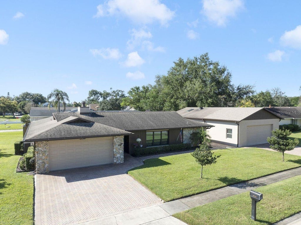 Photo of 4520 Ironstone Circle, Orlando, FL 32812 (MLS # O6449579)