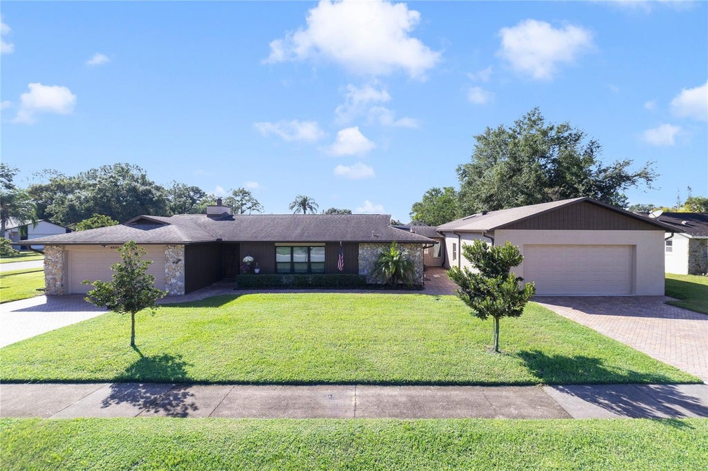 Photo of 4520 Ironstone Circle, Orlando, FL 32812 (MLS # O6449579)
