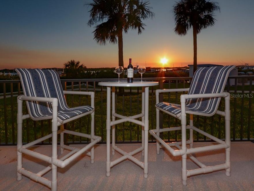 Stunning intracoastal frontage overlooking private deep water marina at prestigious Inlet Marina Villas.  Be entertained watching the dolphins play or enjoying the magnificent sunsets from your 60-foot long wrap-around patio.  Highly upgraded open concept unit features granite counters, stainless appliances, plantation shutters, and ceiling fans throughout. Onsuite with double sinks and oversized shower! Meticulously maintained; move right in and relish the season on the water. Amenities include security gate, direct access to the beach thru Minorca's secured gate, private marina, kayak storage and launch, heated pool, dockside entertainment deck, gazebo with kitchen and gas grills, lighted tennis courts, fire pit, and clubhouse. Inlet Marina Villas is just steps away from Smyrna Dunes Park and its spacious dog beach. You will love the sunsets from here! 

(Total sq Ft and room sizes are from developers' plan.) ;LocationDescription: Condo ;Water: City