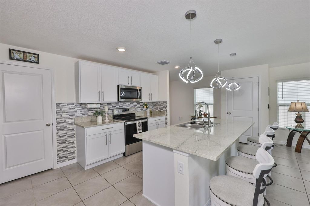 Photo of 2858 Star Anise Lane, Wimauma, FL 33598 (MLS # TB8384220)