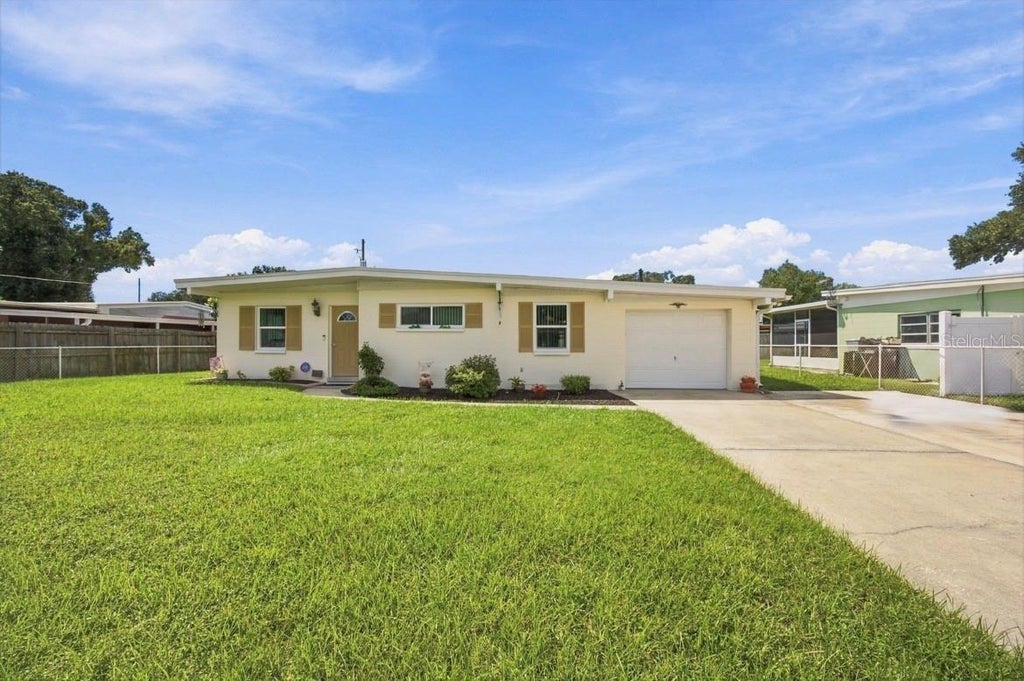 Photo of 7812 N Gomez Avenue, Tampa, FL 33614 (MLS # V4950502)